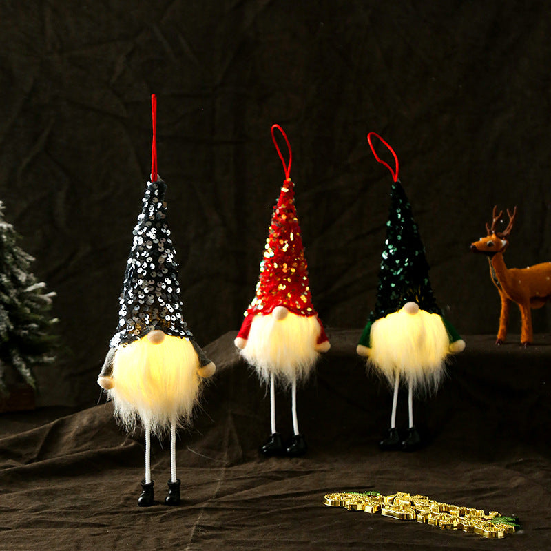 Silver sequinned faceless gnome doll, 11.4 inches tall with long dangling legs