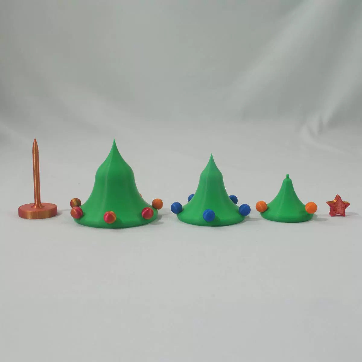 Printed layer lines running across the jointed Christmas tree fidget toy