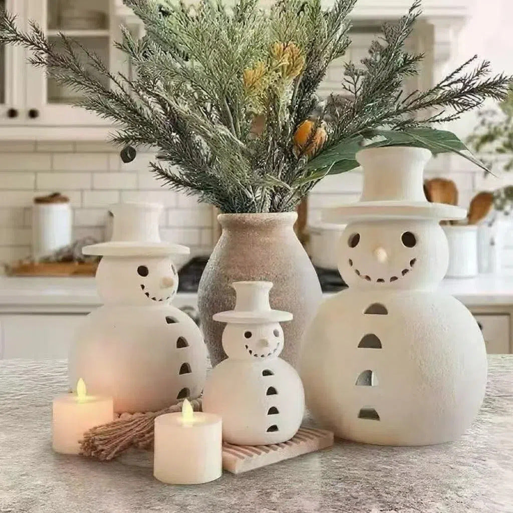 Largest snowman figurine of the set, 9.8 inches tall in resin