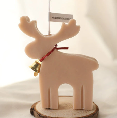 Sculptural reindeer candle body that holds up unlit as a decoration
