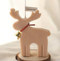 Sculptural reindeer candle body that holds up unlit as a decoration