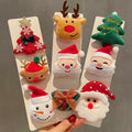 Fabric Christmas brooch pin range shown across twenty nine cloth holiday designs