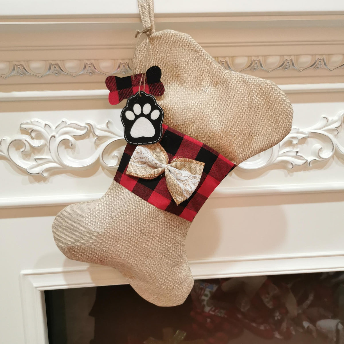 Polyester pet Christmas stocking in a bone or fish shape
