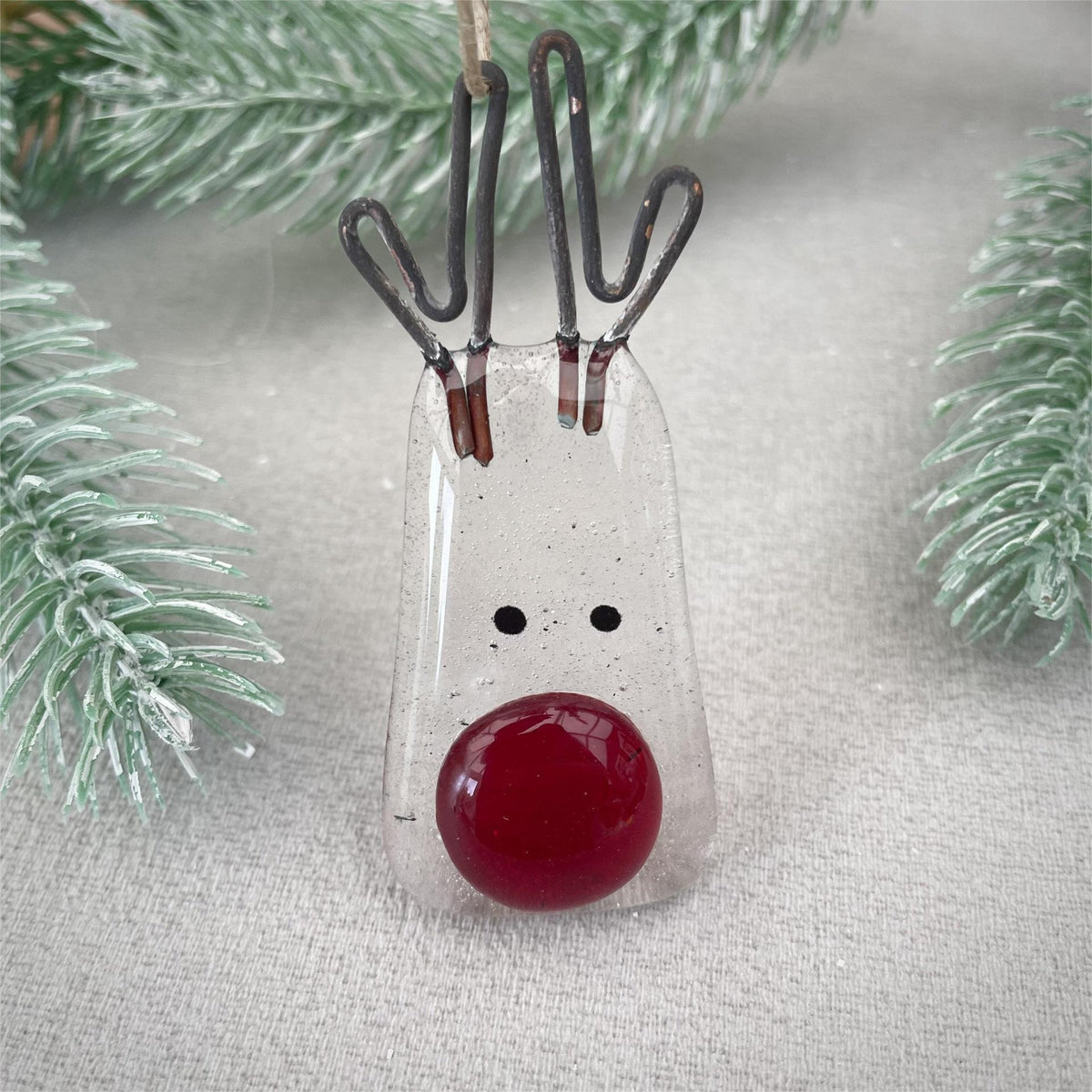 Glass Christmas pendant in a traditional American holiday style