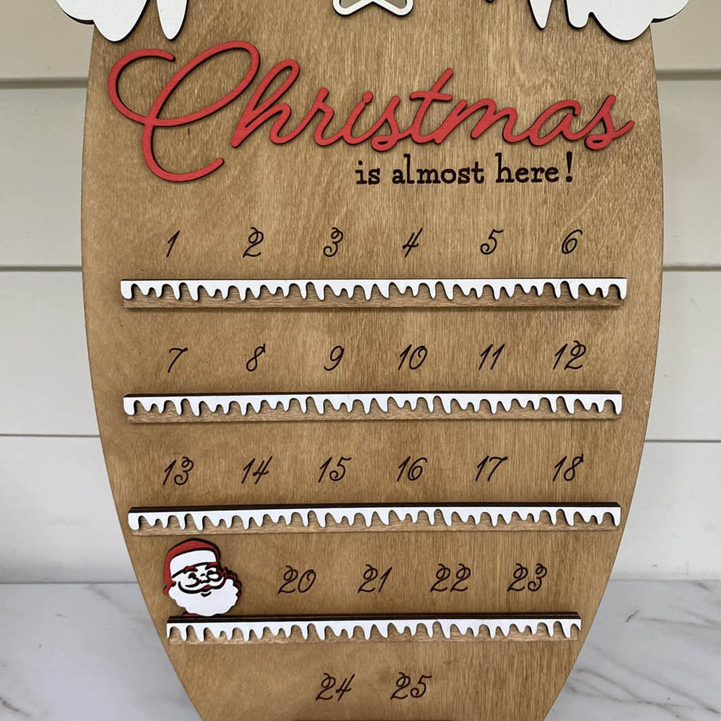 Advent countdown ornament in wood for marking the days before Christmas