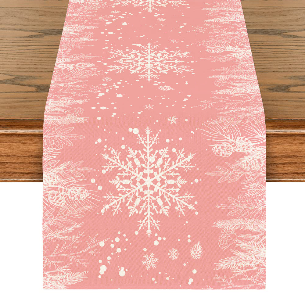 Pink runner with snowflake and Christmas tree patterning throughout