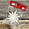 Raised three dimensional form of the white snowflake pendant