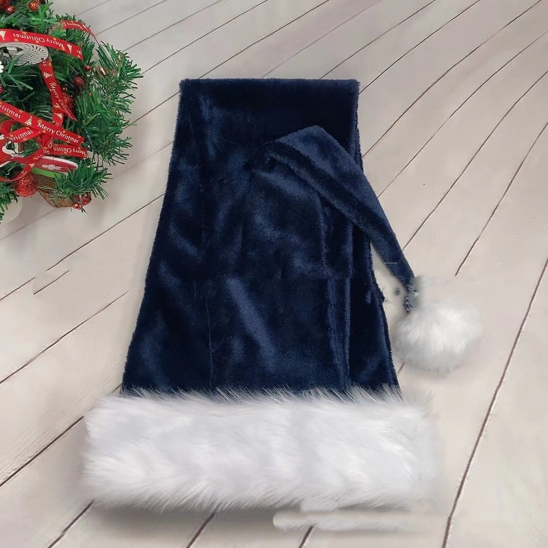 Navy blue extra long Santa hat from the eight color range