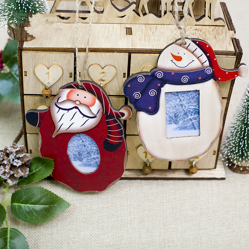 Painted wooden Christmas photo frame ornament sized to hold a real photograph