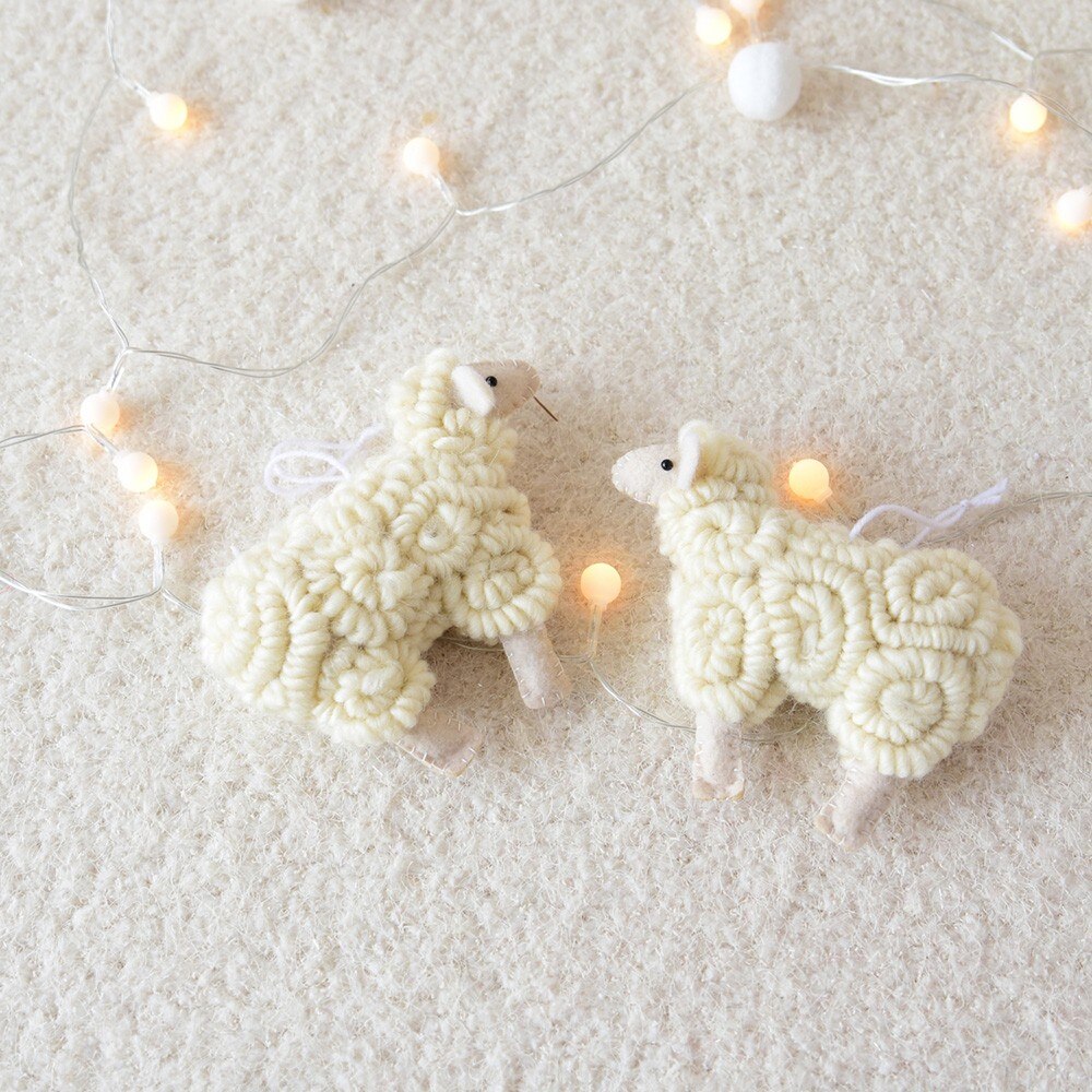 Wool felt Christmas sheep, about 5.5 by 4.7 inches, in neutral beige