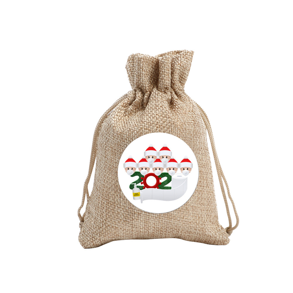Brown fabric Christmas candy sack printed with a family household design