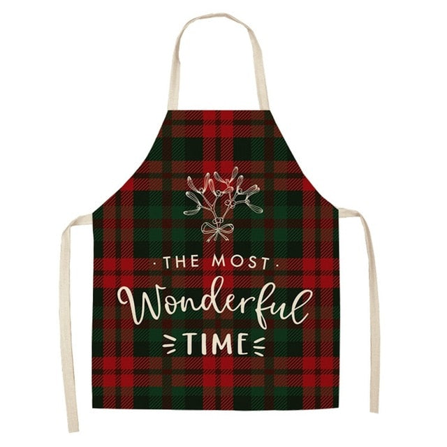 Holiday printed apron shown in full, neck strap through to hem