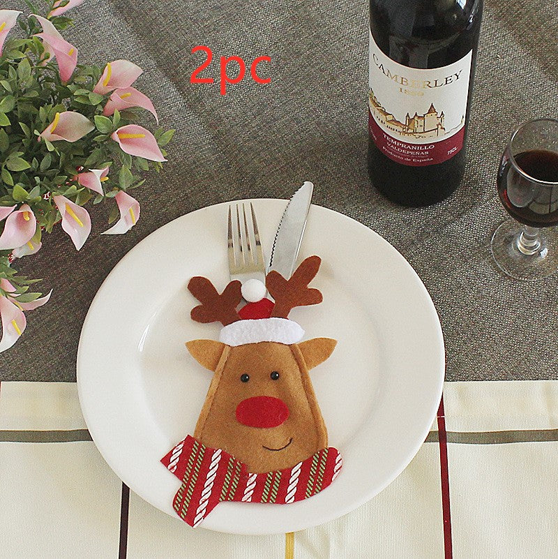 Christmas silverware holder with a sewn seam along the lower edge