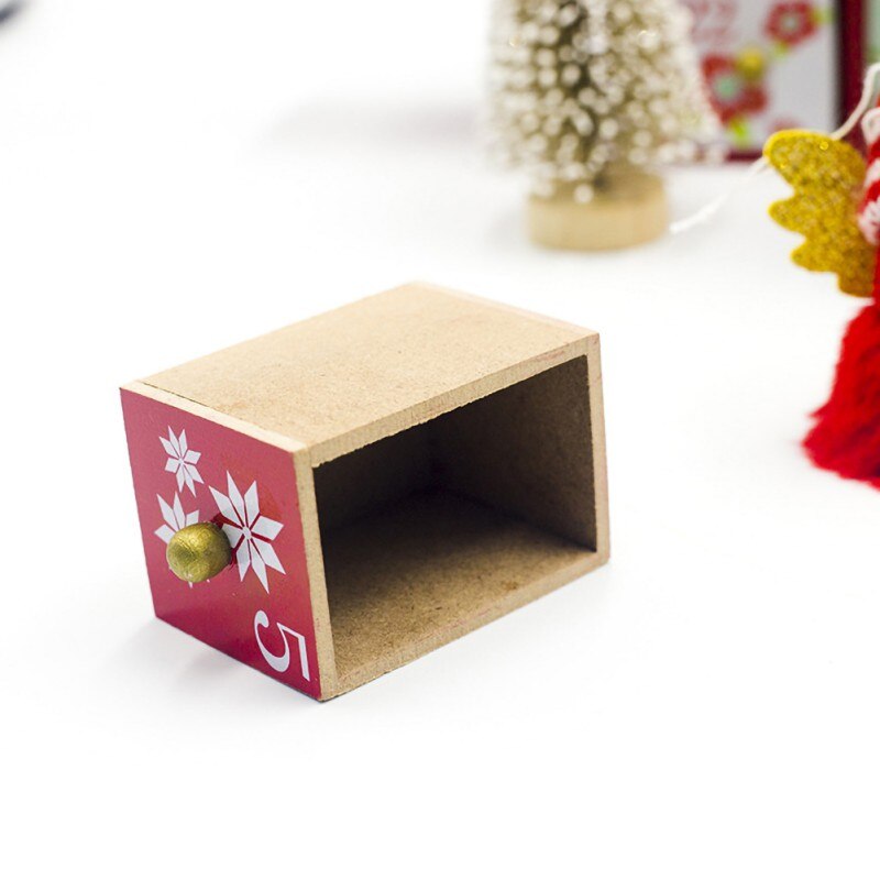 Third advent calendar style, complete with its decorative topper