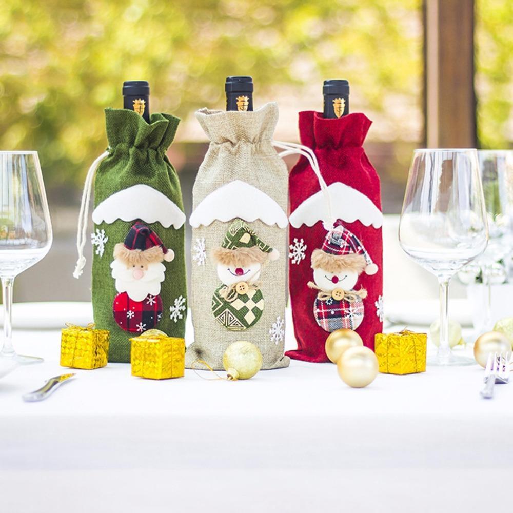 Christmas wine bottle cover sewn from cloth and artificial wool