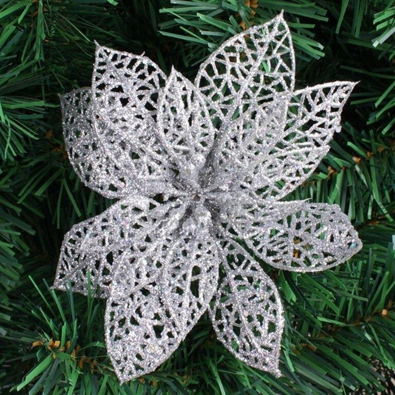 Glitter Christmas flower picks used to fill gaps on a Christmas tree