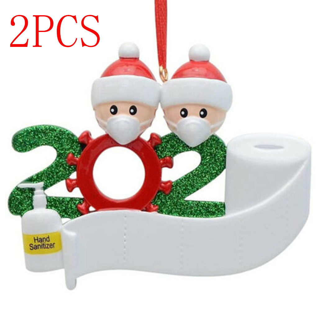 Small resin snowman family ornament sized for a Christmas tree