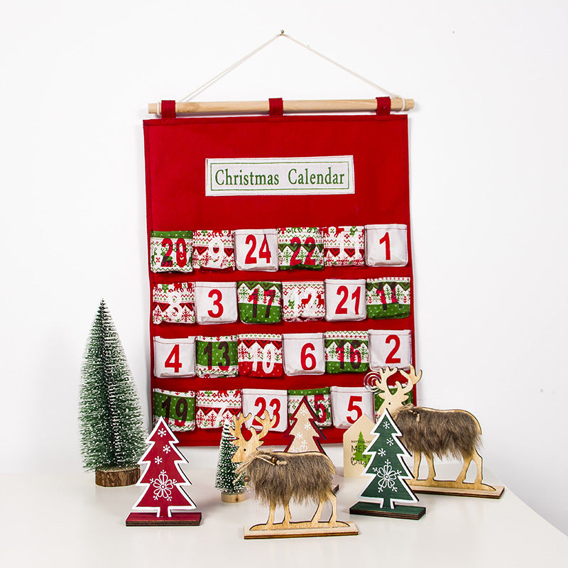 Red hanging advent calendar bag with numbered fabric pockets