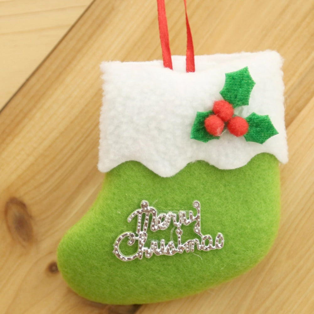 Red mini Christmas stocking ornament cut and sewn from soft cloth
