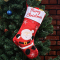 Red Santa Christmas stocking in non-woven fabric, ready to hang