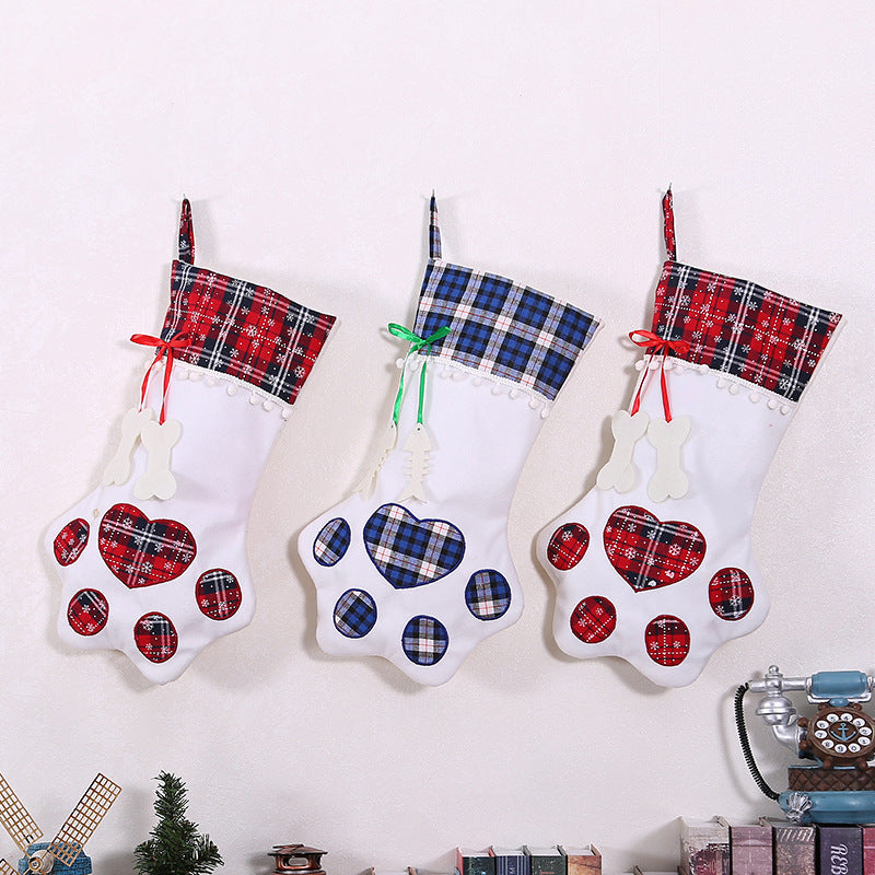 Blue dog paw Christmas stocking measuring 7.9 by 18.1 inches