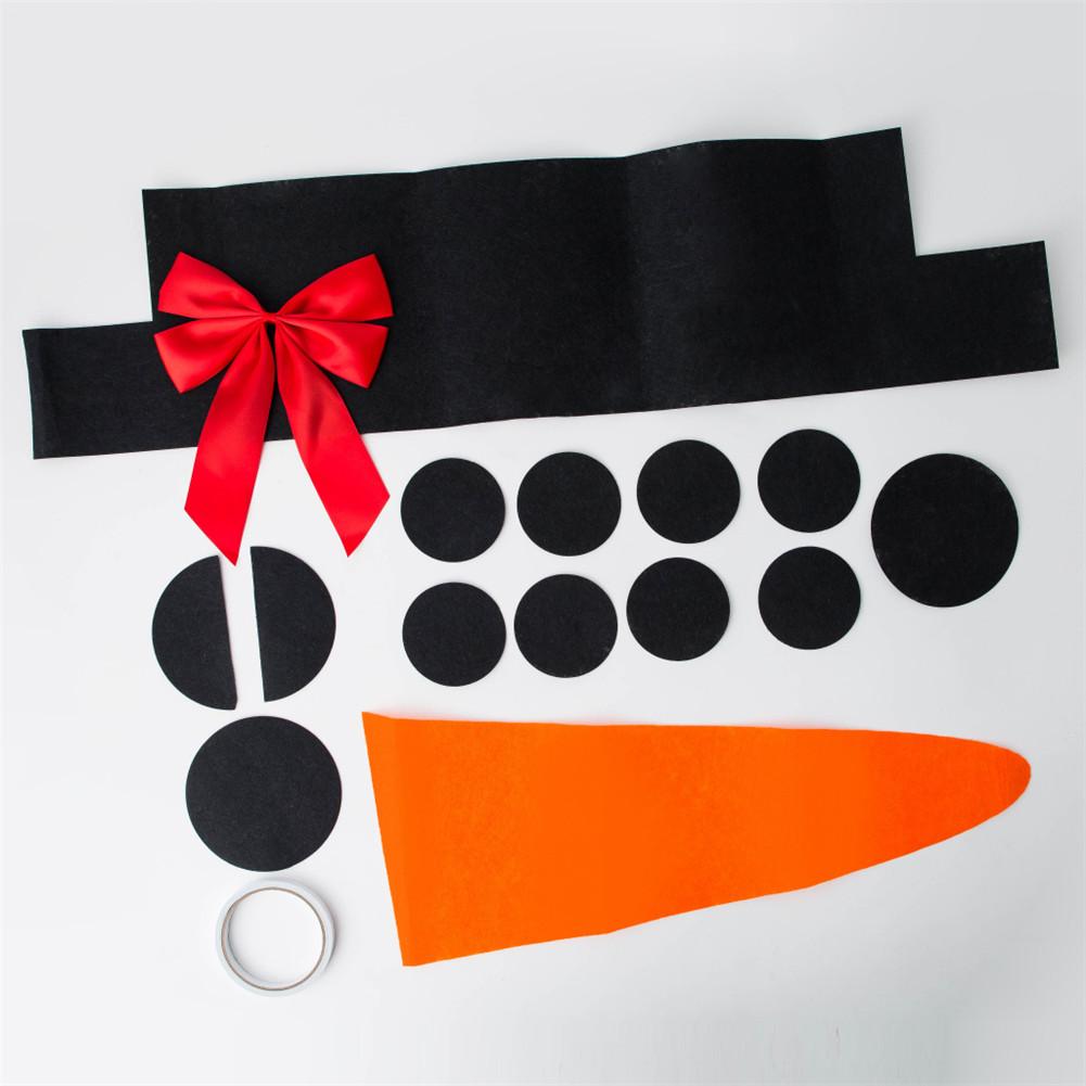 Double-sided tape included with the DIY Christmas snowman face kit