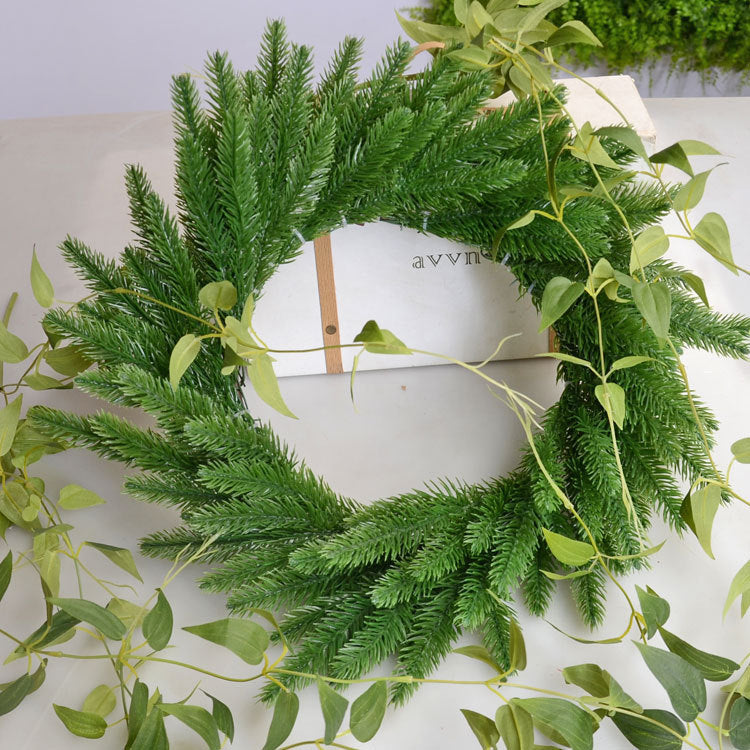 Pack of twenty artificial pine needle sprigs supplied per order