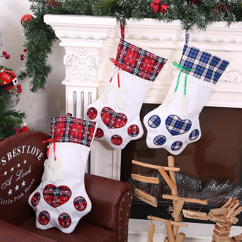 Dark green paw print Christmas stocking at its full 18.1 inch length