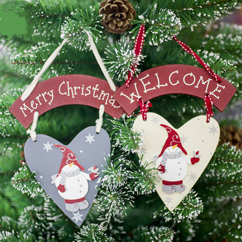 Painted wooden Christmas snowman sign, 5.9 by 9.8 inches