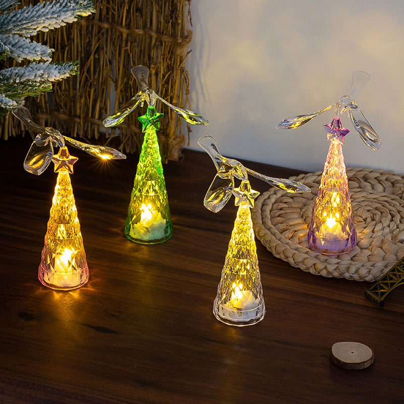Mini Christmas tree night light with birds that rotate around the trunk