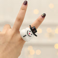 Four Christmas finger light designs: tree, snowman, snowflake and Santa