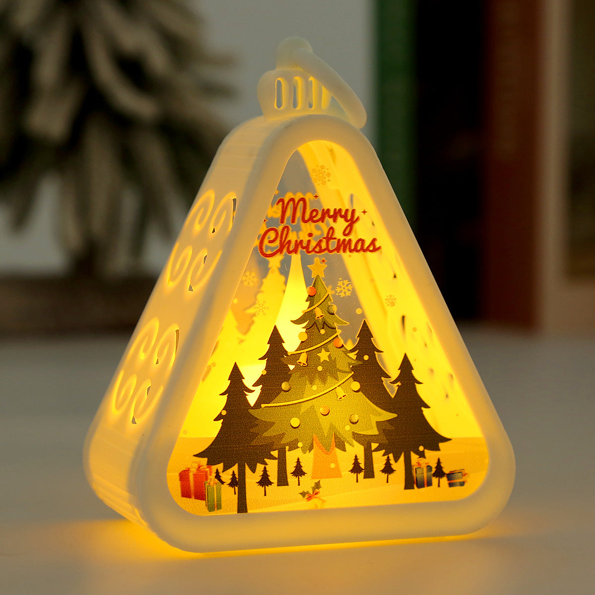 Triangular bronze Christmas night light with a Santa figure