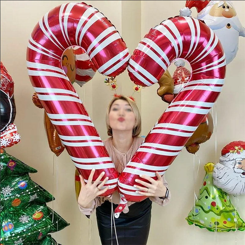 Red foil candy cane balloon standing 32.7 inches tall