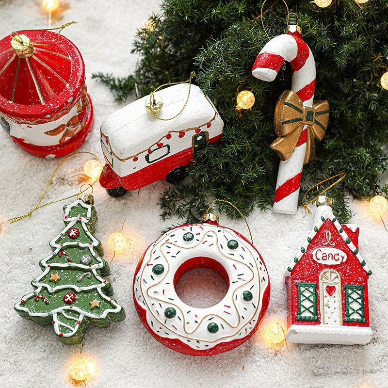Snowman in a car Christmas ornament, painted plastic, sold singly