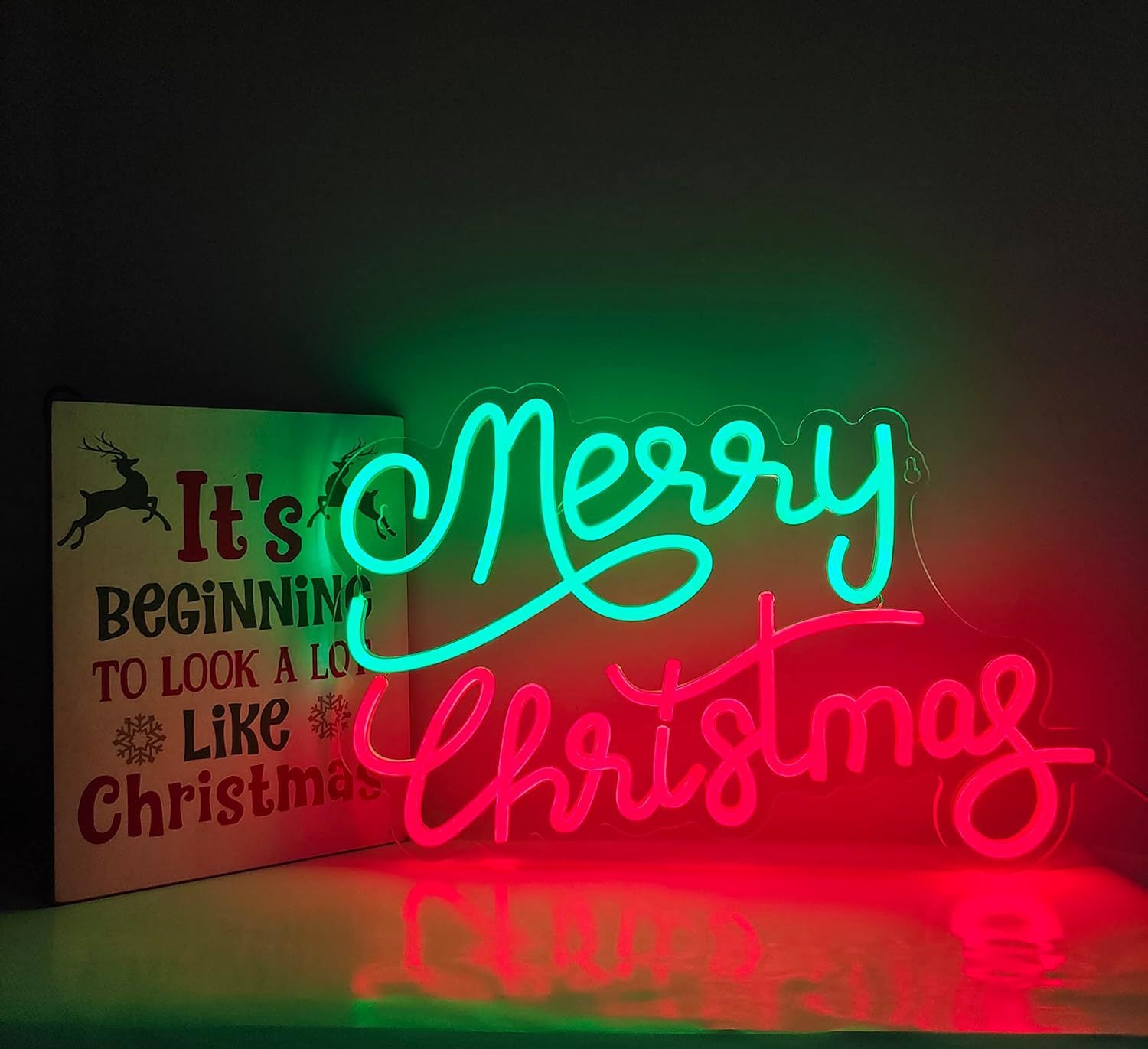 Christmas neon signboard with a bright gnome figure in LED tubing