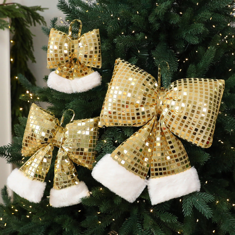 Large gold sequin bow for a Christmas tree, one of three sizes