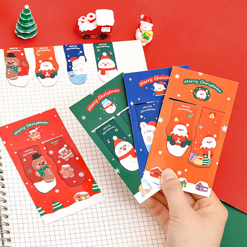 Christmas magnetic bookmark printed with a gingerbread figure design