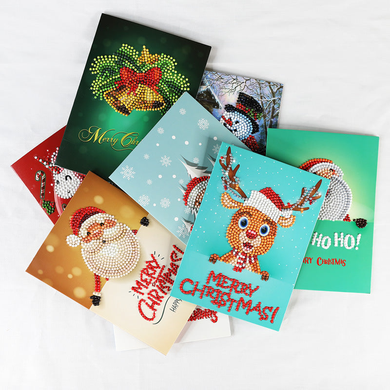 Handmade style Christmas greeting card covered in sparkling faceted beads