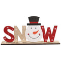 Wooden word ornament ready to hang from a Christmas tree