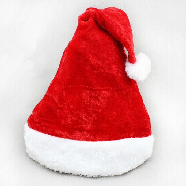Cuff and pompom at the tip of the plush Santa hat