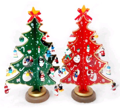 Green painted wooden Christmas tree silhouette in solid timber