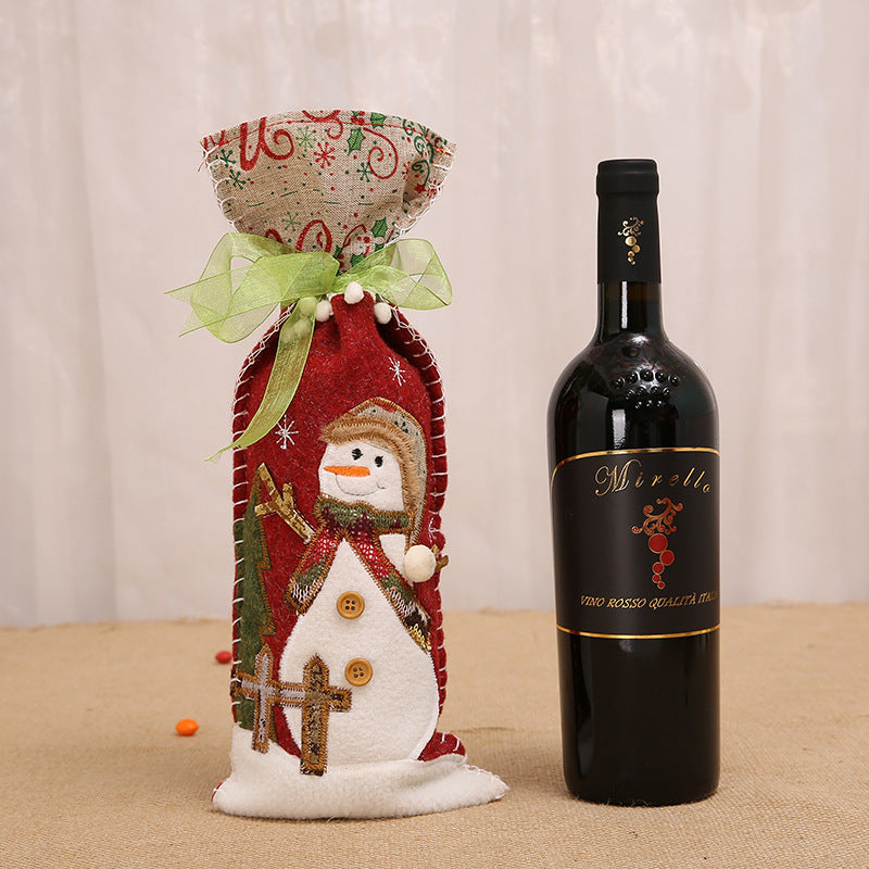 Ribbon tie and printed fabric edge on the Christmas bottle sleeve