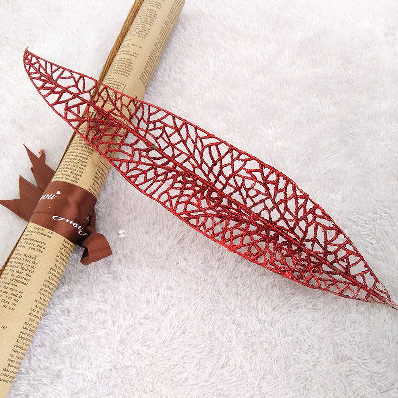Glitter coated artificial leaves on a shapeable plastic stem