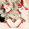 Christmas character earmuff headband with a band that flexes to fit