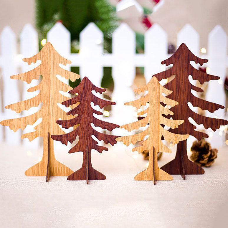 Several wooden reindeer ornaments from the same four finish range