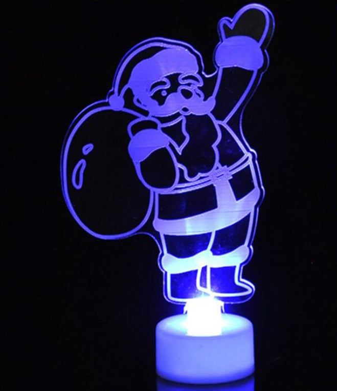 Christmas night light offered as a tree, a Santa or a snowman