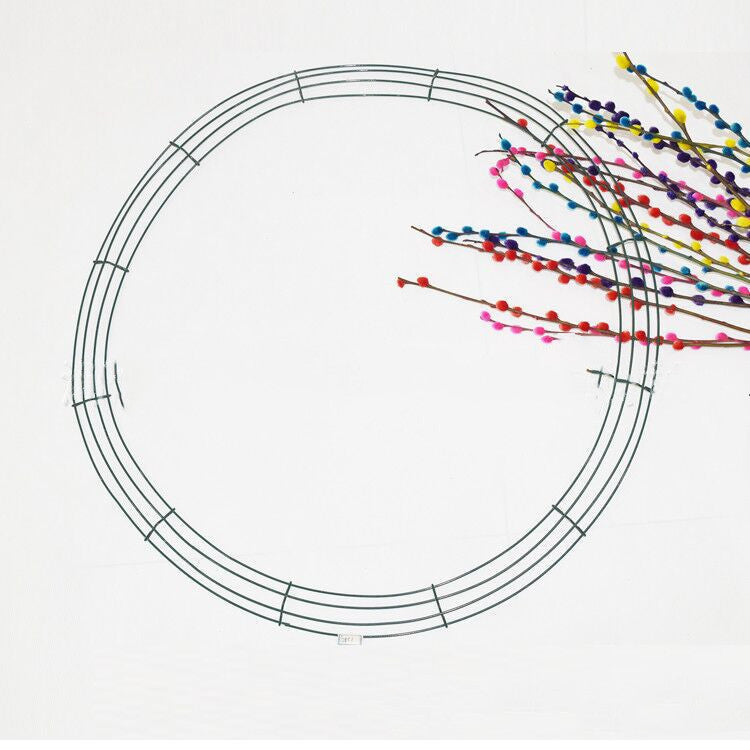 Gold finished steel wire wreath ring measuring 12 inches in diameter