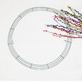 Gold finished steel wire wreath ring measuring 12 inches in diameter