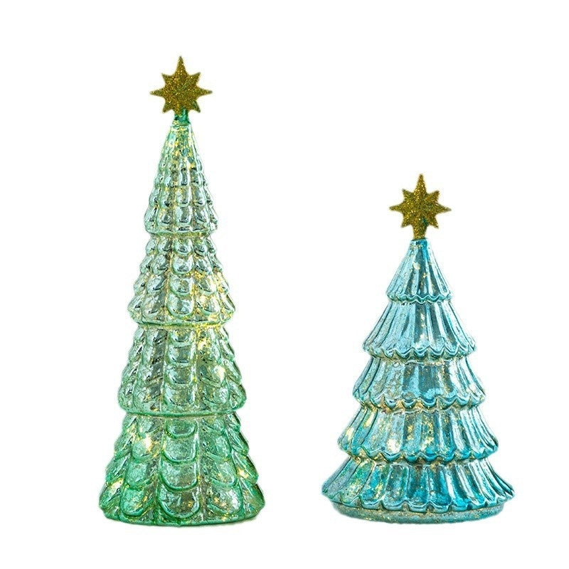 Five-pointed glass star ornament in green, one of three star finishes