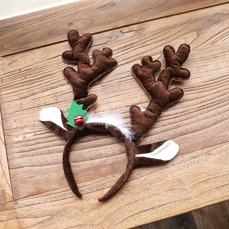 Oversized cloth reindeer antlers on a single headband, 14.2 inches across
